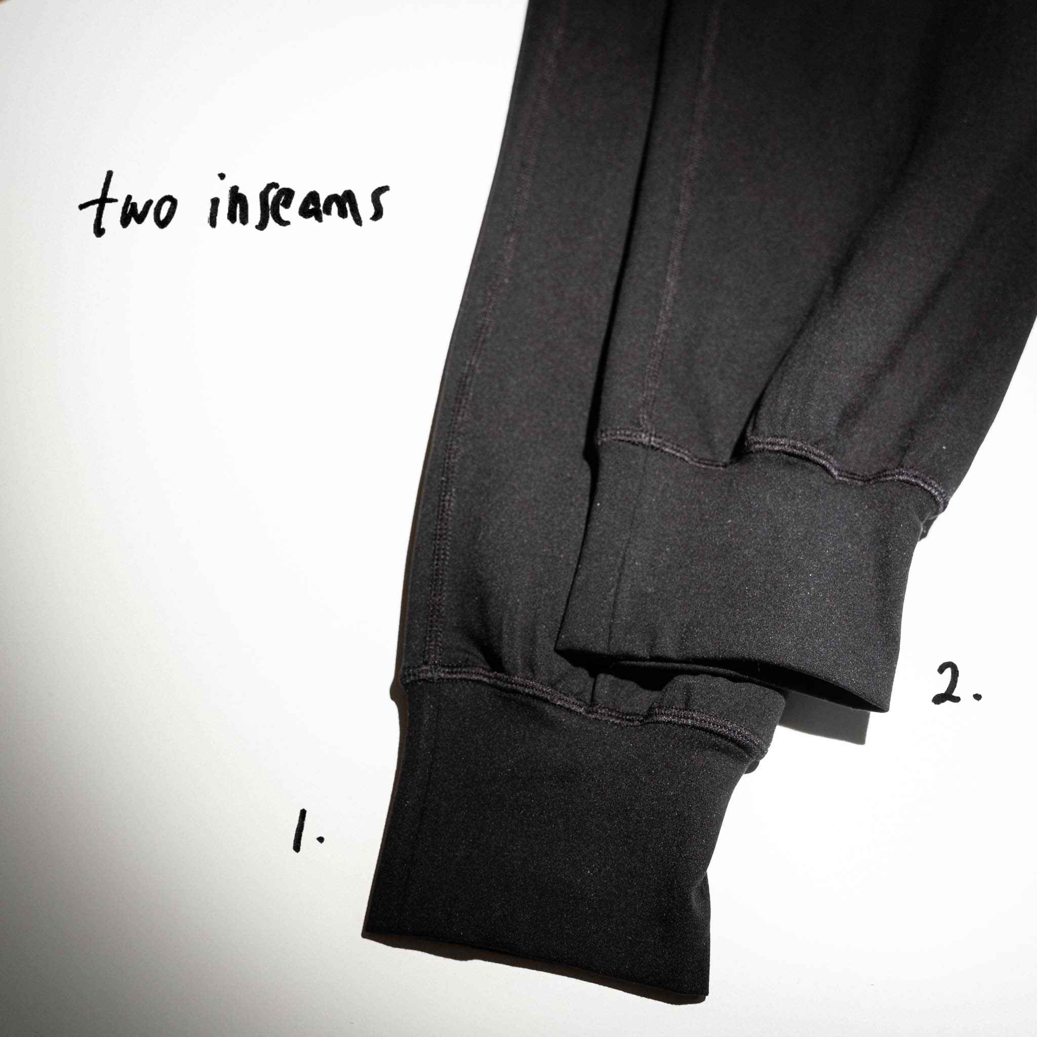 Closeup of two different inseams of ninepine's asana joggers