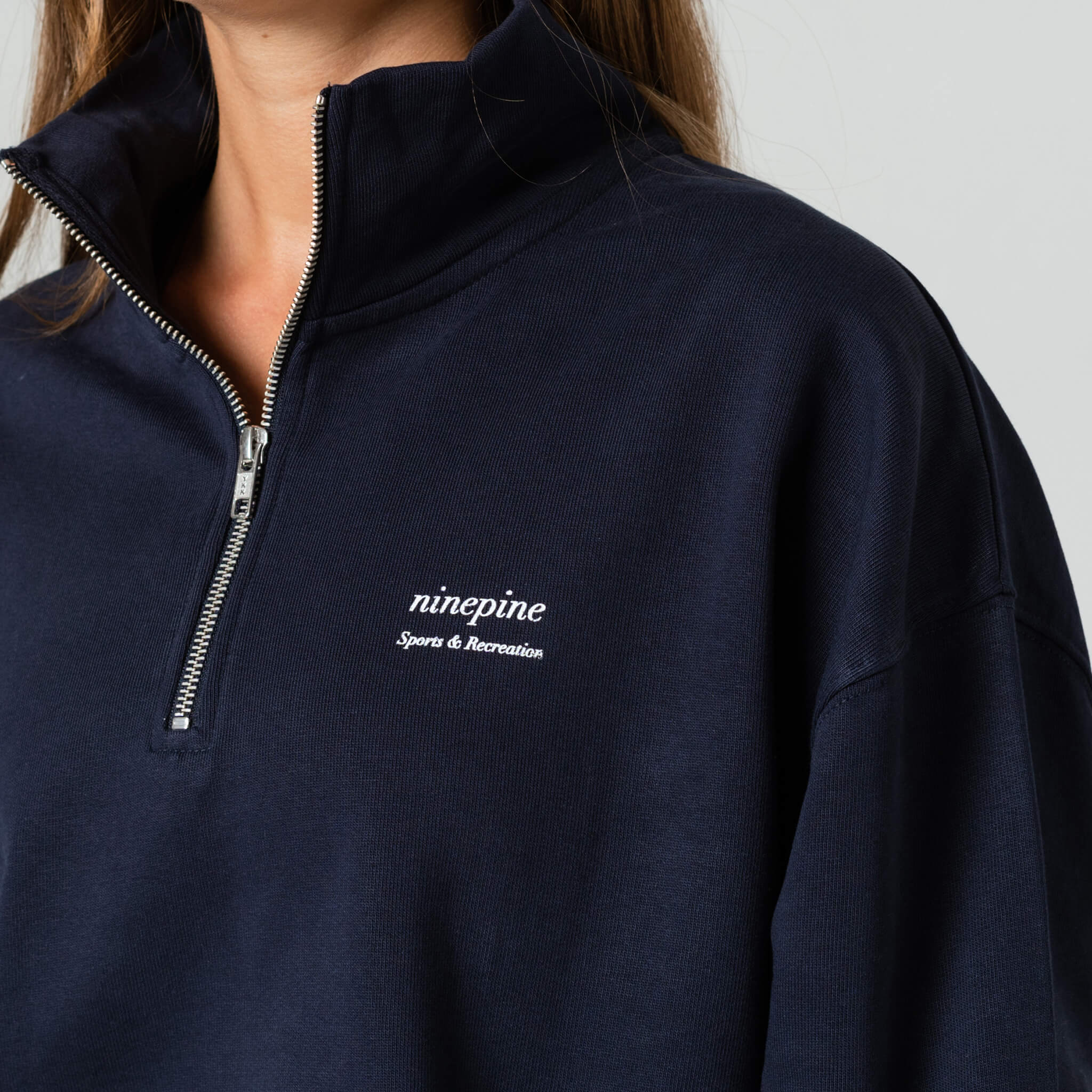 Pullover mit Viertelreißverschluss und lockerer Passform – Ninepine